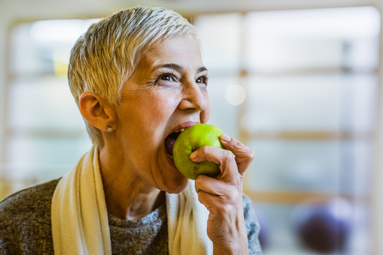 Why Dental Implants Feel & Function Like Natural Teeth